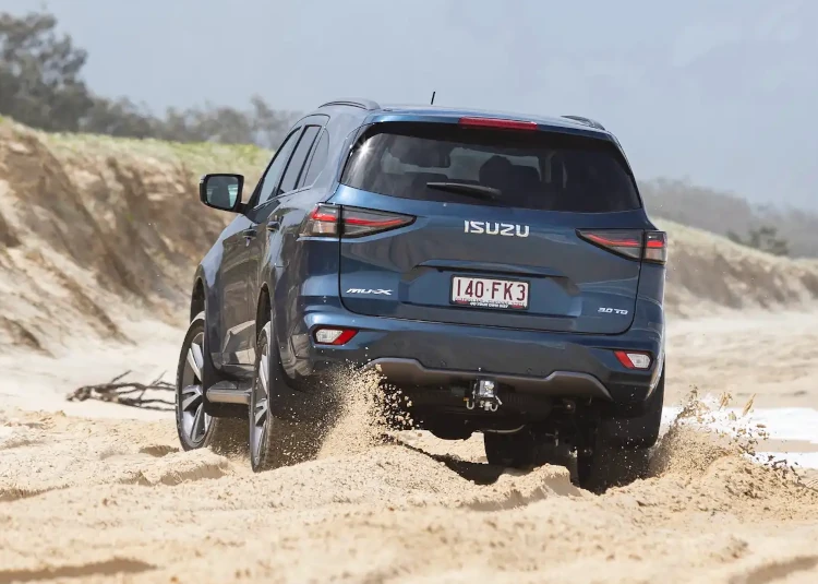 2023 isuzu mu-x sand beach driving